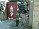 CSM and a little Iraqi boy.JPG